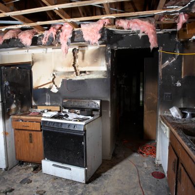 Charred kitchen in a house gutted by fire